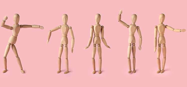 Wooden figurine of a man in different poses