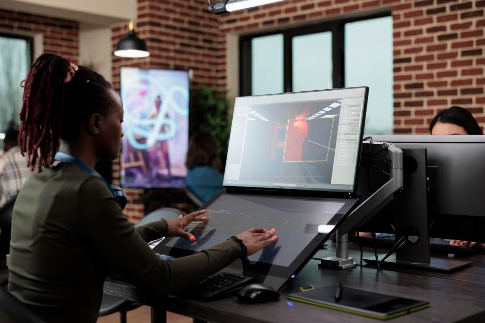 Girl working at the computer on a project