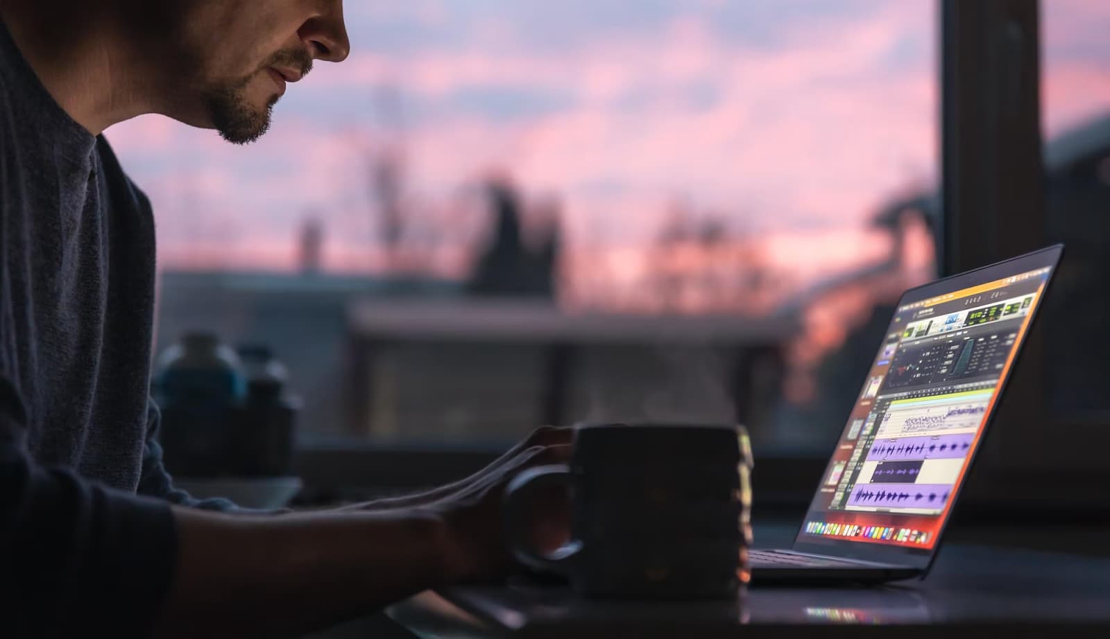 Man working on a project on a laptop
